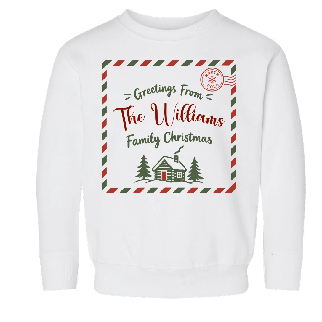 Custom Personalized  “Greetings From” Family Christmas Name Toddler Sweatshirt Front